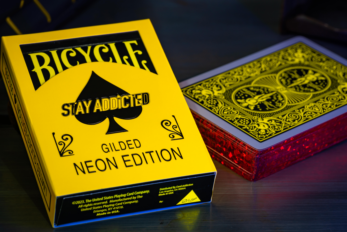 Gilded Bicycle Neon Rider Back Yellow-Starburst Deck Playing Cards