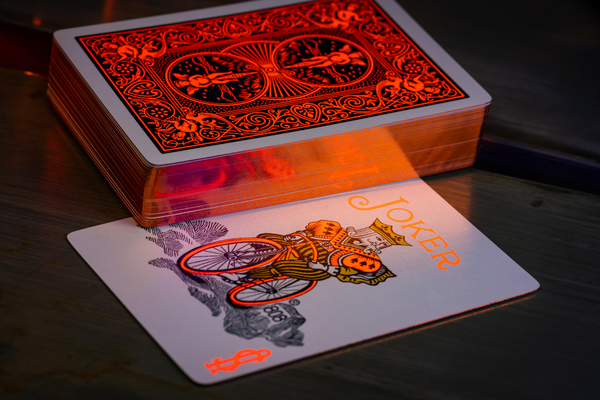 Gilded Bicycle Neon Rider Back Solar-Orange Deck Playing Cards
