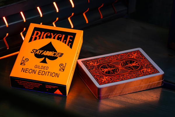 Gilded Bicycle Neon Rider Back Solar-Orange Deck Playing Cards