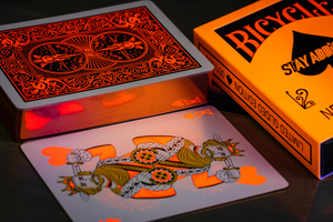 Gilded Bicycle Neon Rider Back Solar-Orange Deck Playing Cards